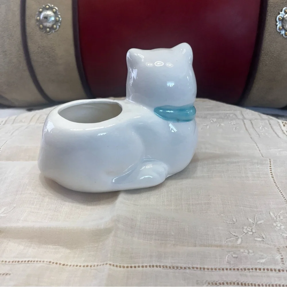 White Ceramic Cat-Shaped Planter with a Blue Scarf Adorned with Fish.